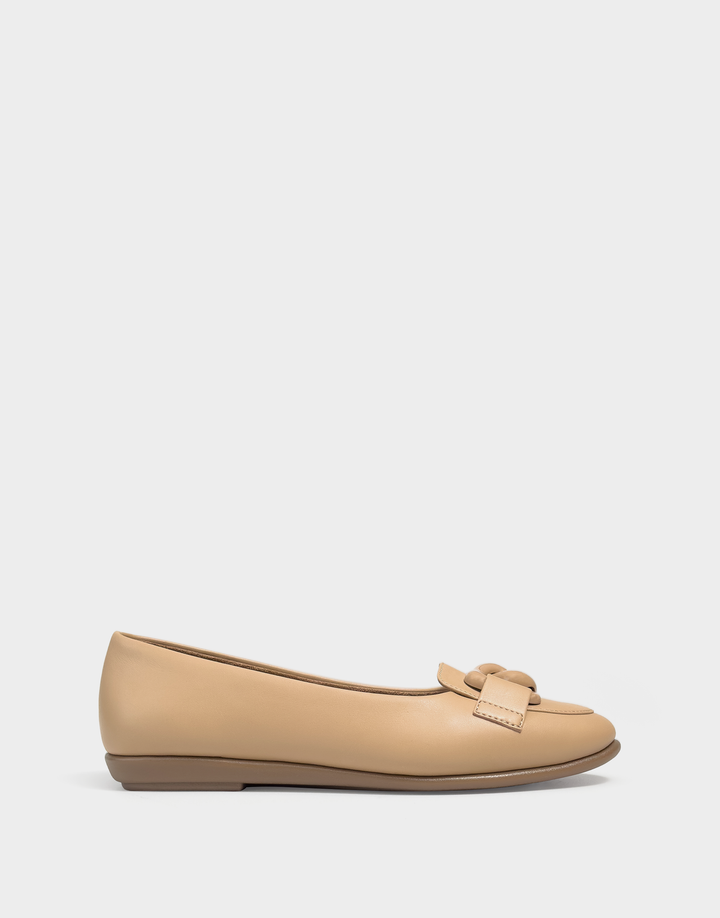 Angled view of the Aerosoles Bell beige leather dress sandal showing the round open toe and adjustable ankle strap.