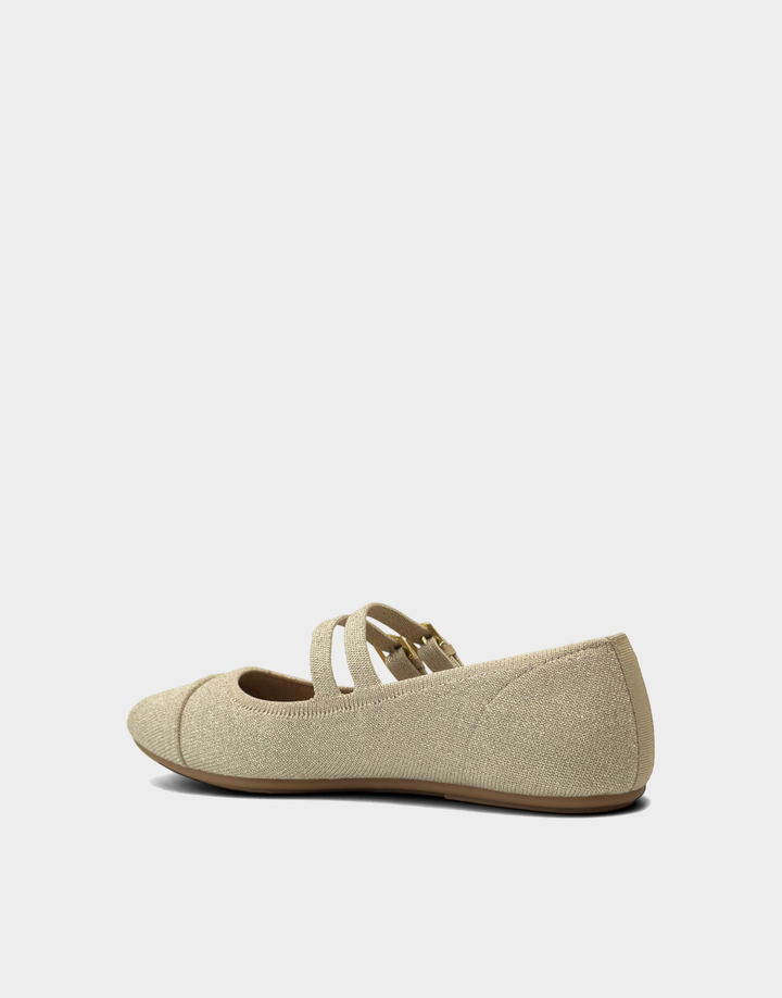 Lateral side view of the Aerosoles Brit flat in metallic Soft Gold, highlighting the flexible knit construction and low-profile design.