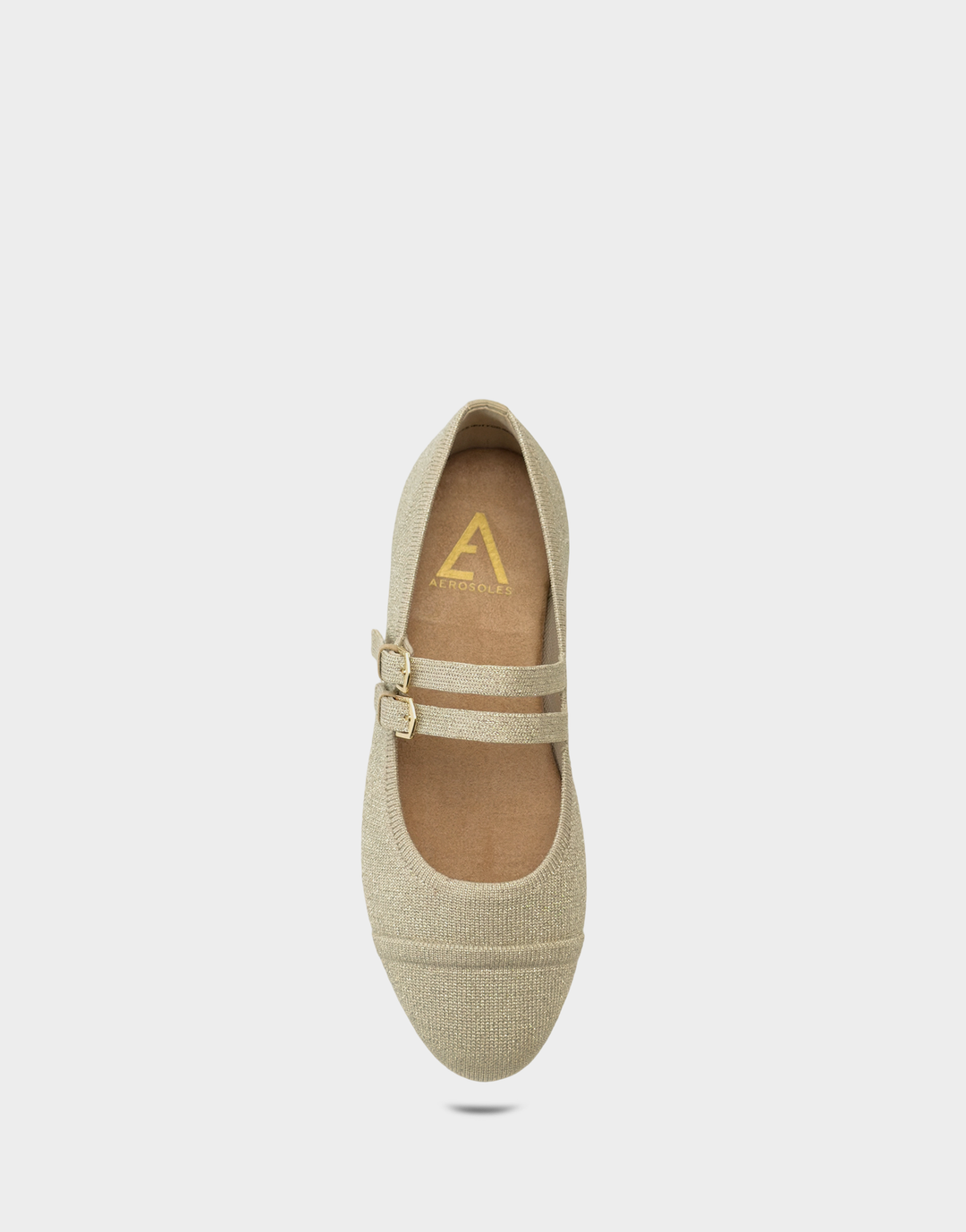 Overhead view of the Aerosoles Brit Soft Gold Knit flat revealing the cushioned Recovery® foam insole and metallic Mary Jane straps.