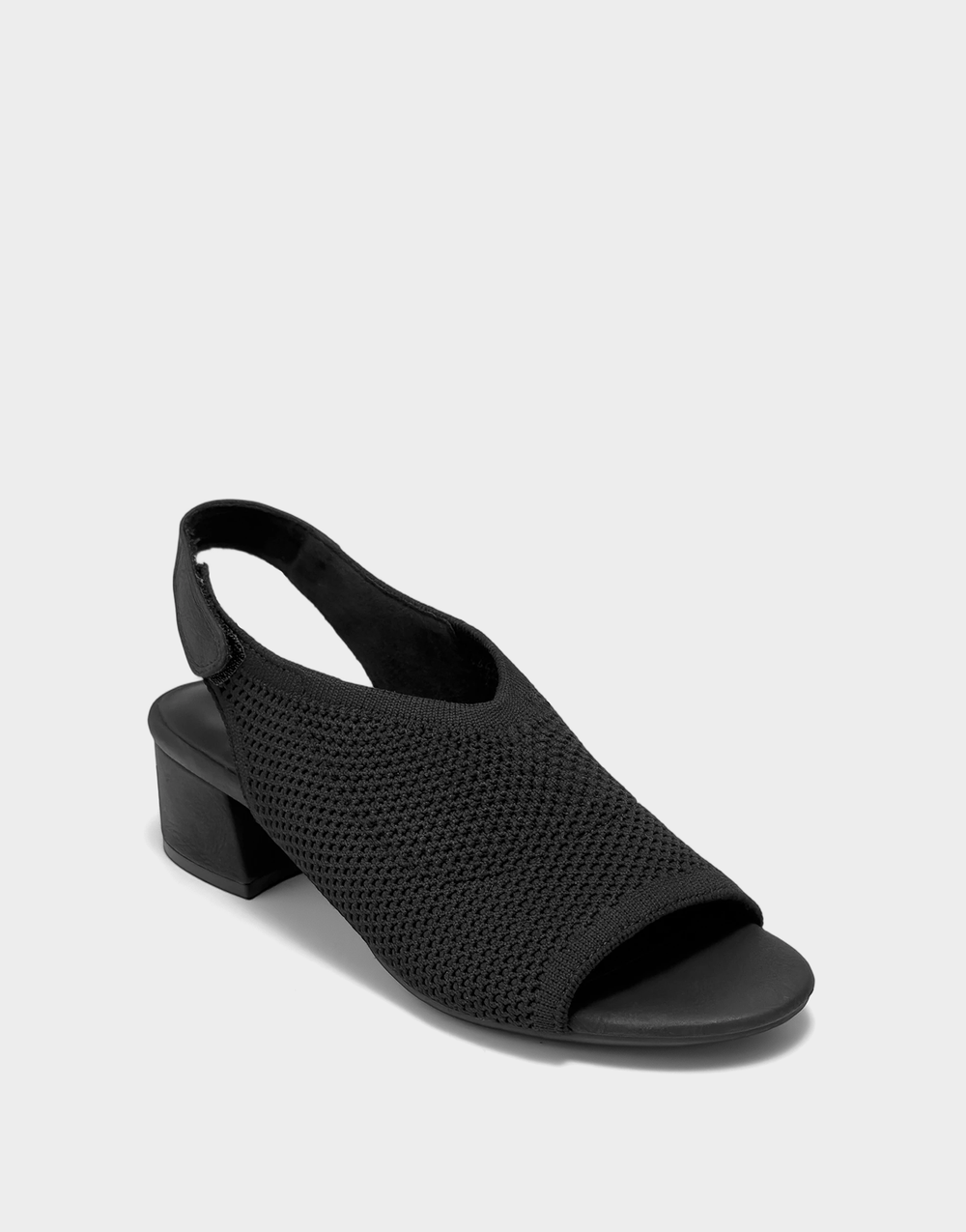 Angled view of the Aerosoles Costi black knit pump showcasing the modern square toe and breathable textured fabric.