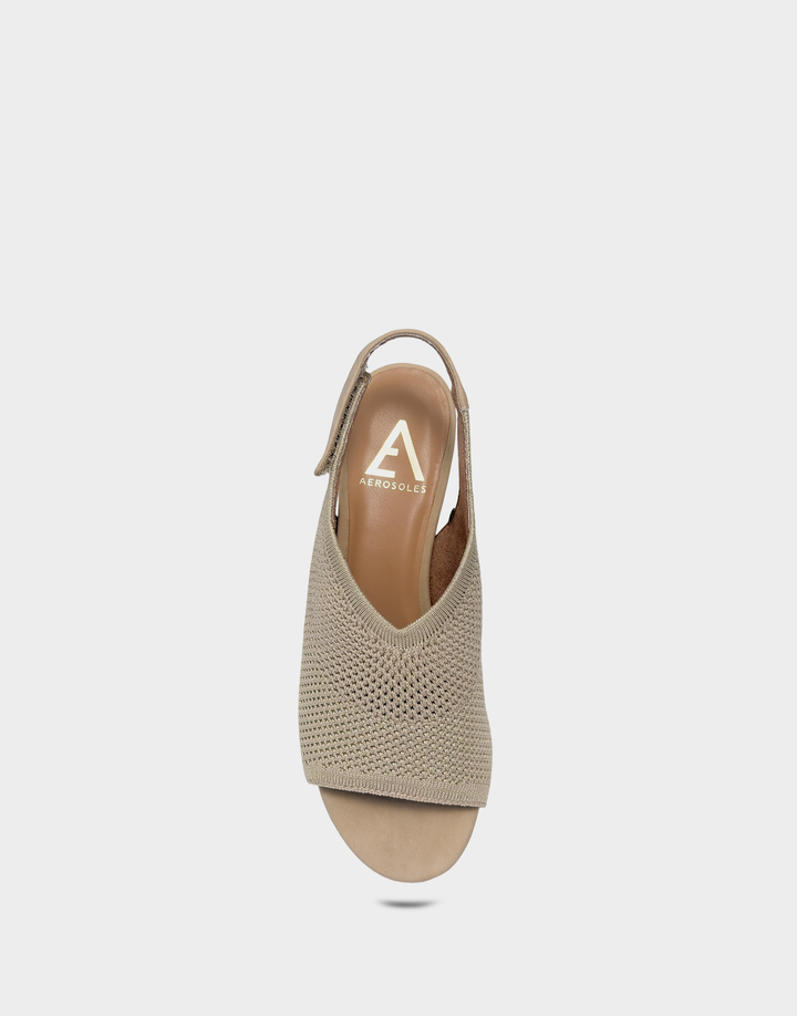 Overhead view of the Aerosoles Costi Soft Gold knit heel revealing the breathable Ortholite® foam insole for premium cushioning.