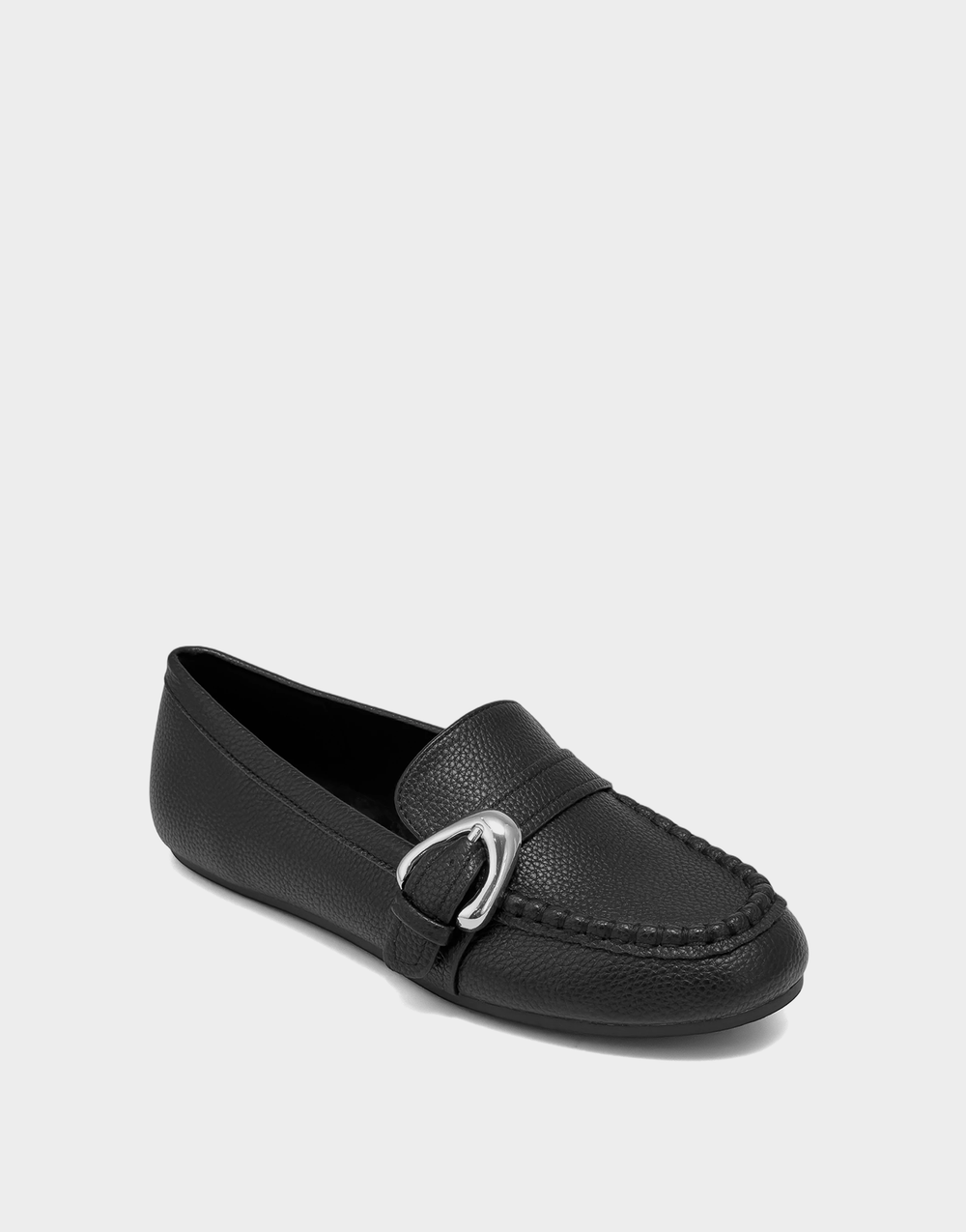 Angled view of the Aerosoles Dinetta black loafer showcasing the classic round toe and textured pebbled finish.