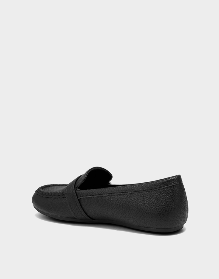 Lateral view of the Dinetta slip-on loafer highlighting the Stitch 'N Turn construction for superior flexibility and comfort.