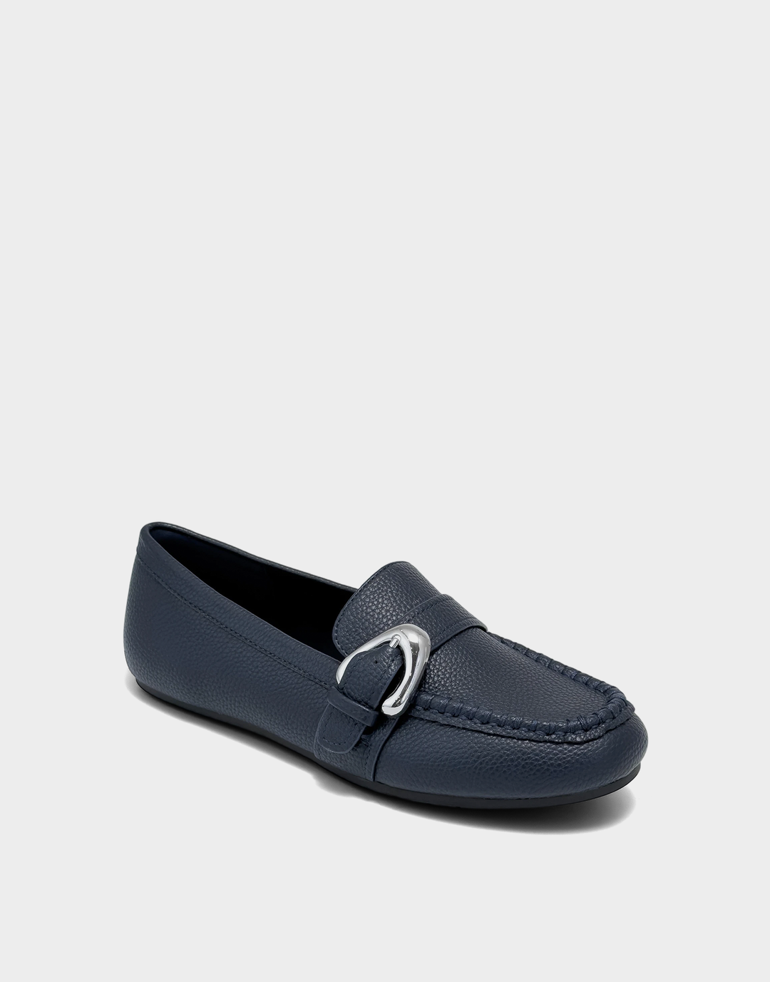 Angled view of the Aerosoles Dinetta navy loafer showcasing the classic round toe and premium textured pebbled finish.