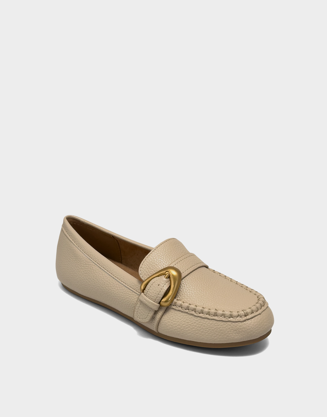 Angled view of the Aerosoles Dinetta stone loafer showcasing the classic round toe and light neutral pebbled texture.