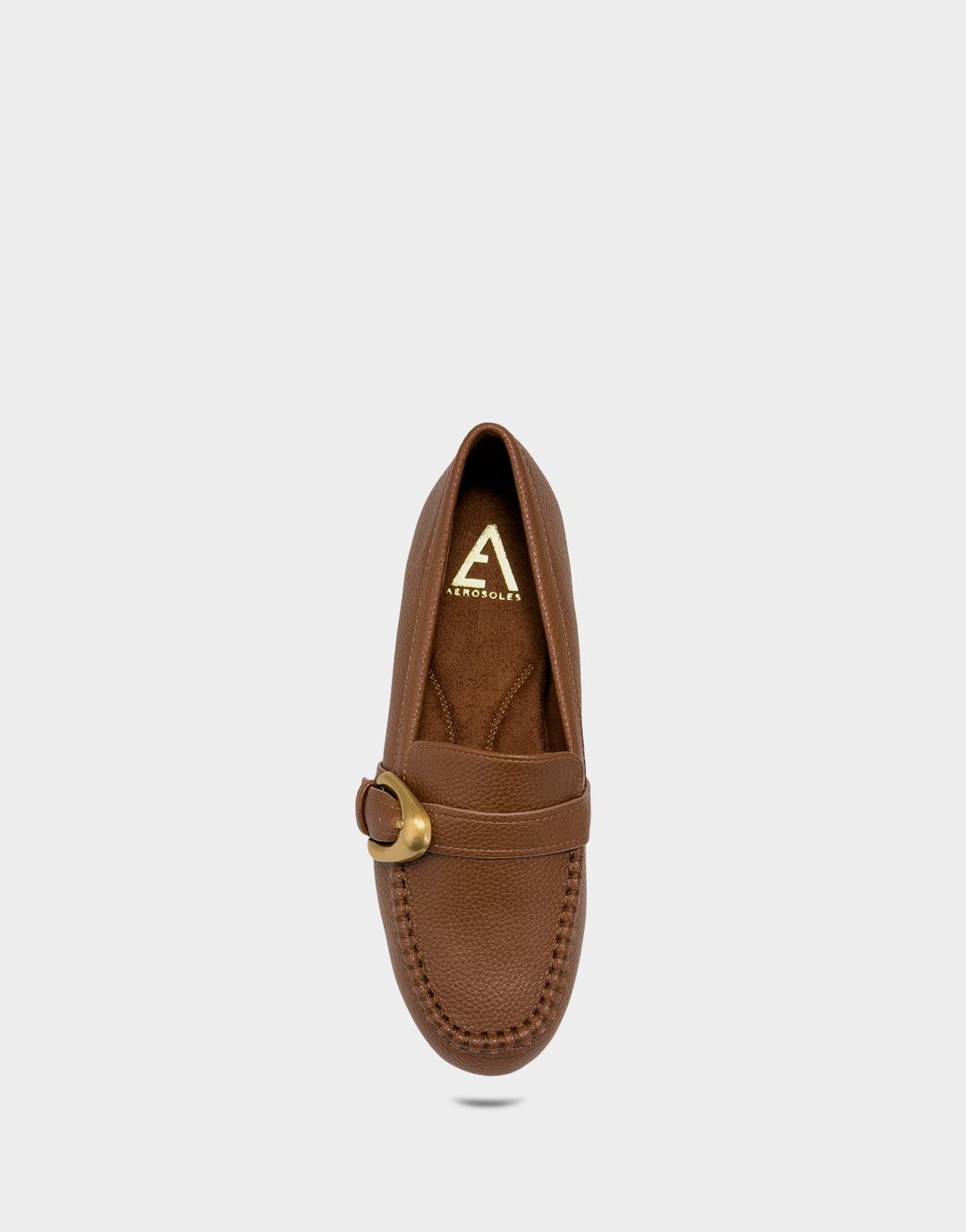Overhead view of the Dinetta tan loafer revealing the cushioned Ortholite® foam insole for all-day, breathable support.