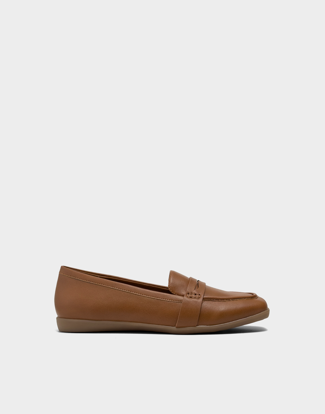 Side profile of the Aerosoles Kody loafer in Chestnut Faux Grain featuring a flexible step-in silhouette and a low, walkable heel.
