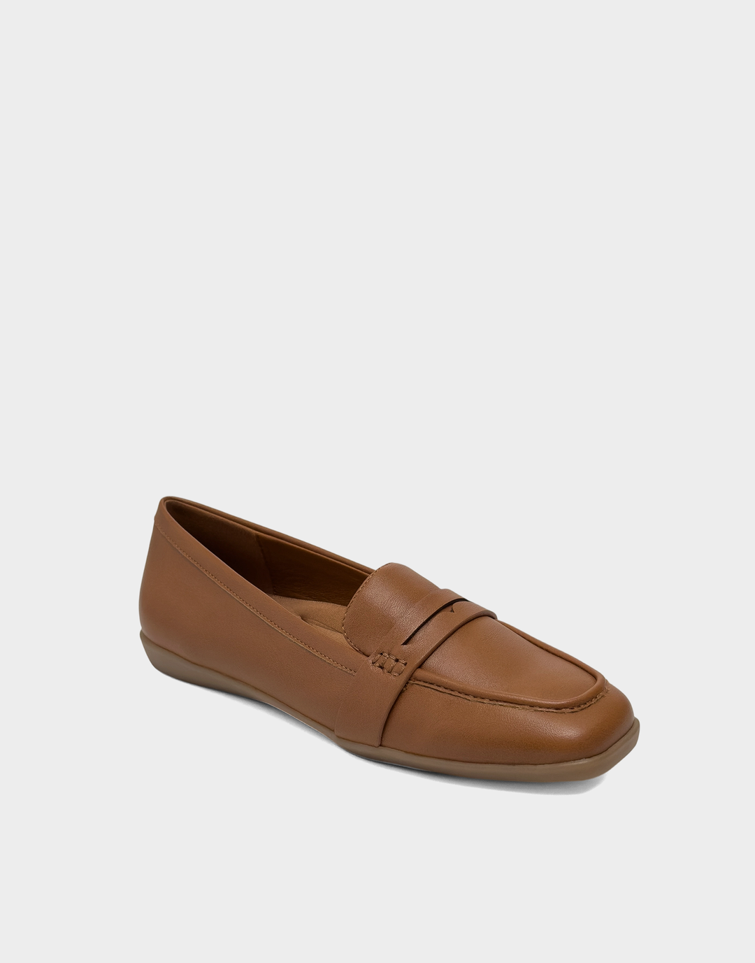 Angled view of the Aerosoles Kody chestnut loafer showcasing the classic penny loafer strap and textured grain finish.