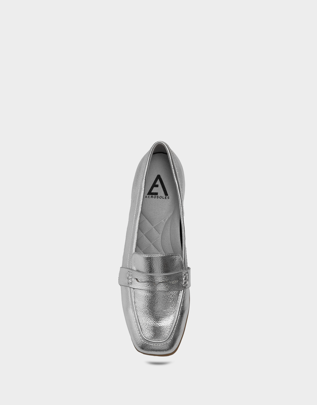 Overhead view of the Kody silver metallic loafer revealing the cushioned Ortholite® foam insole for all-day breathable support.