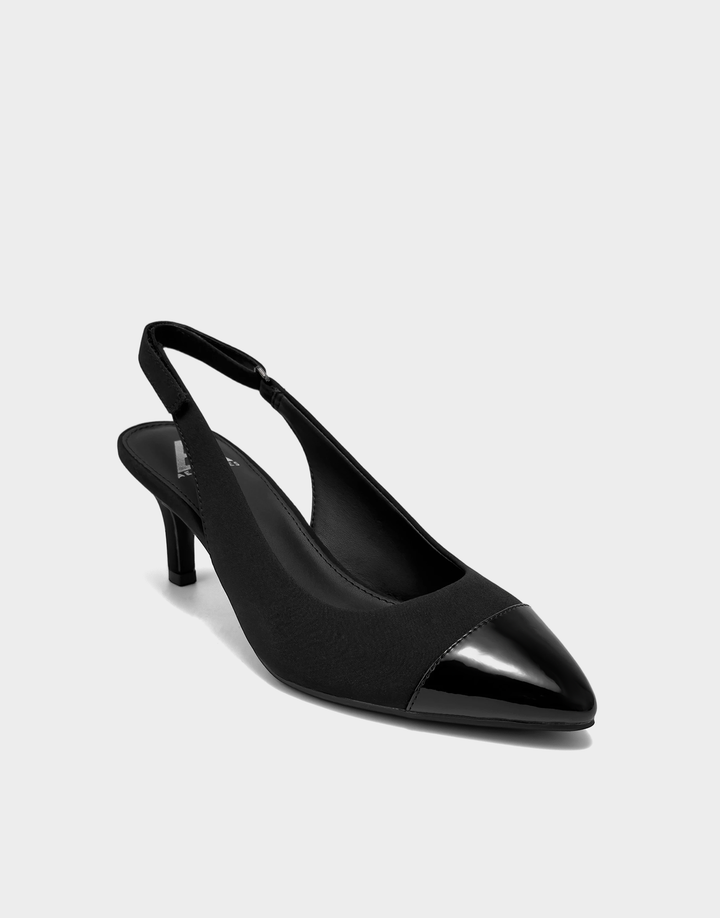 Angled view of the Aerosoles Levi black sandal showcasing the square toe and the contrast between the matte stretch fabric and high-shine faux patent trim.