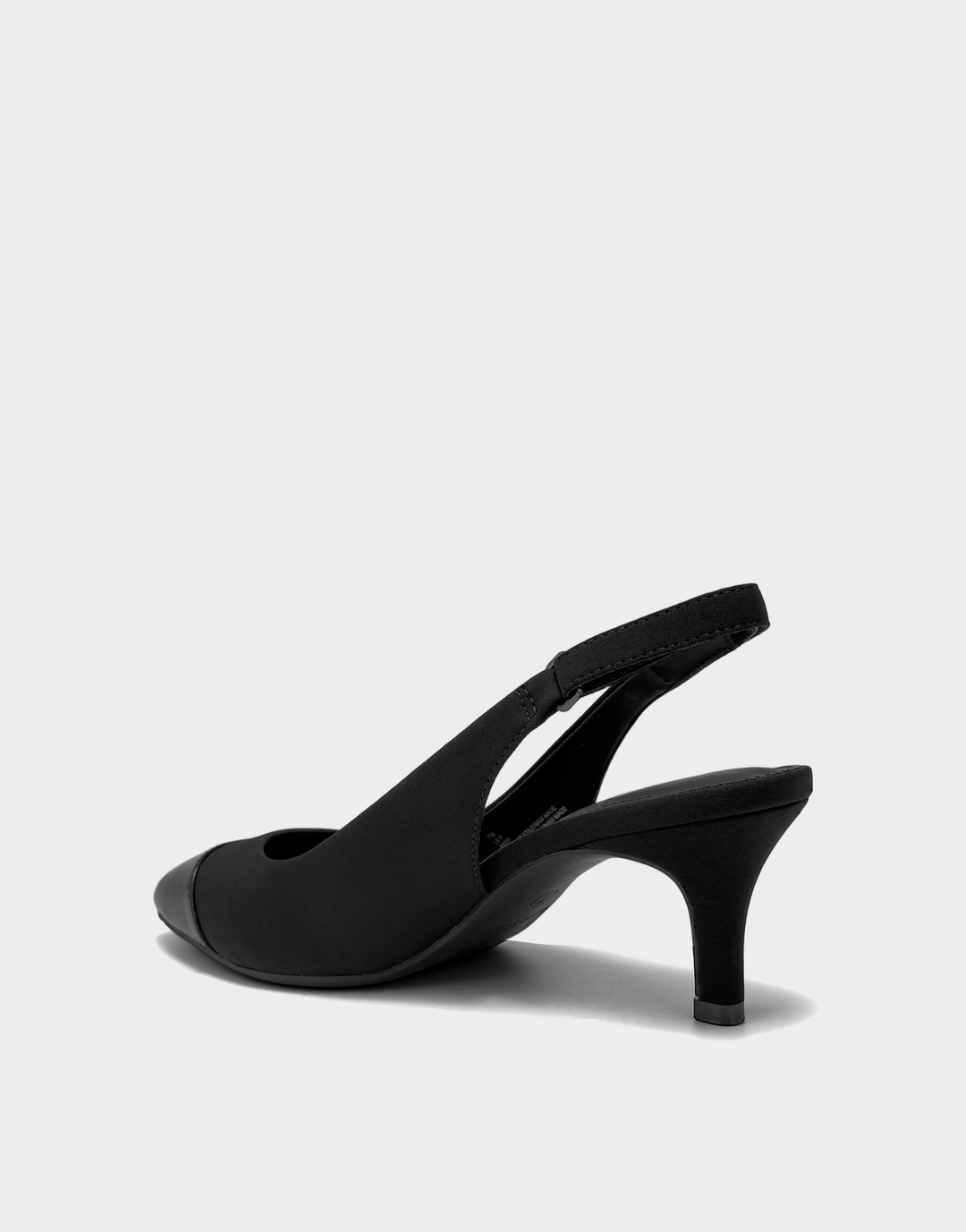 Lateral view of the Levi slingback sandal highlighting the flexible stretch gabardine upper and secure, adjustable ankle strap.