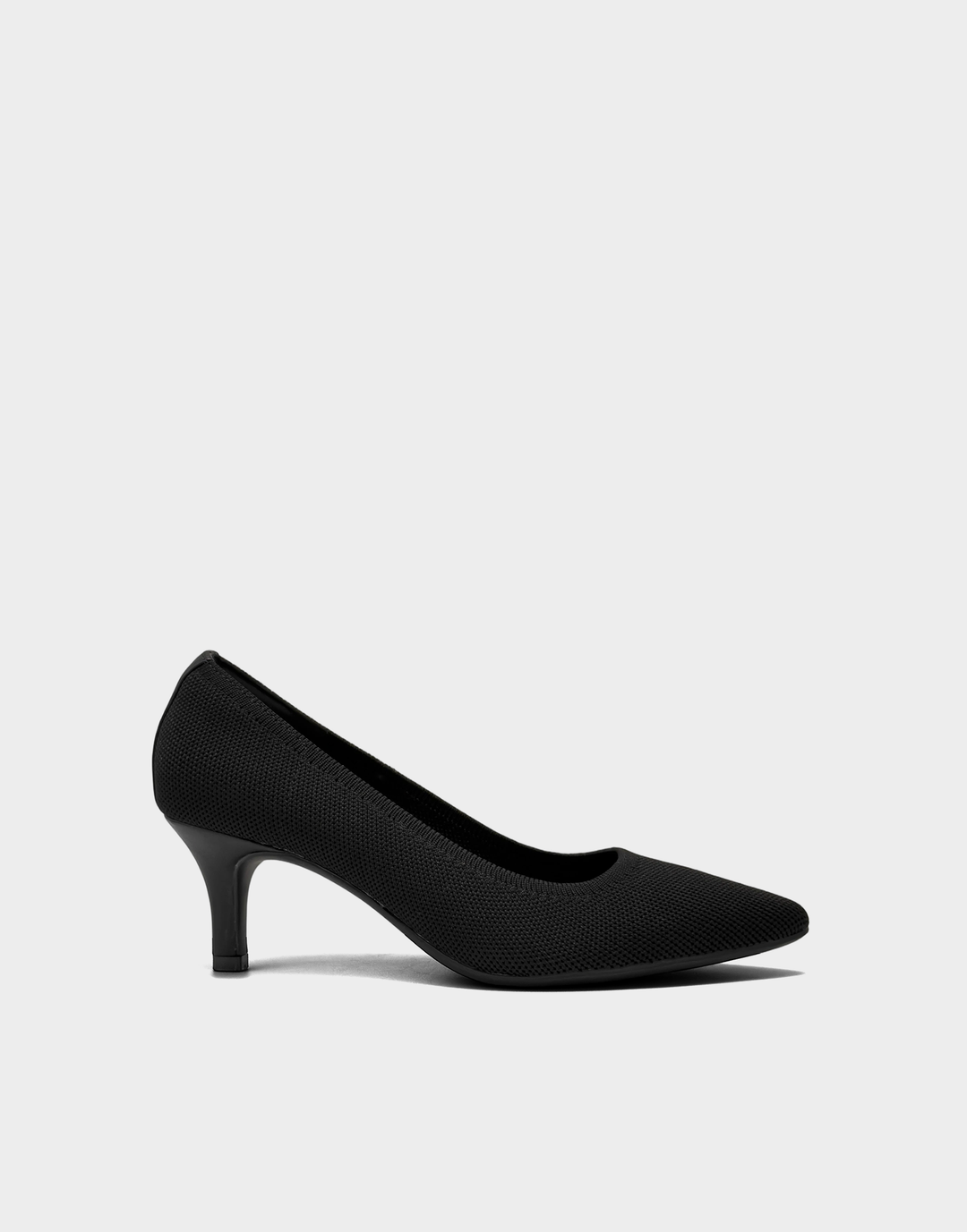 Side profile of the Aerosoles Lexi slingback sandal in Black Knit featuring a sleek block heel and flexible stretch upper.