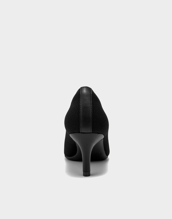 Rear view of the Aerosoles Lexi sandal showcasing the stable, fabric-wrapped block heel and secure slingback closure.