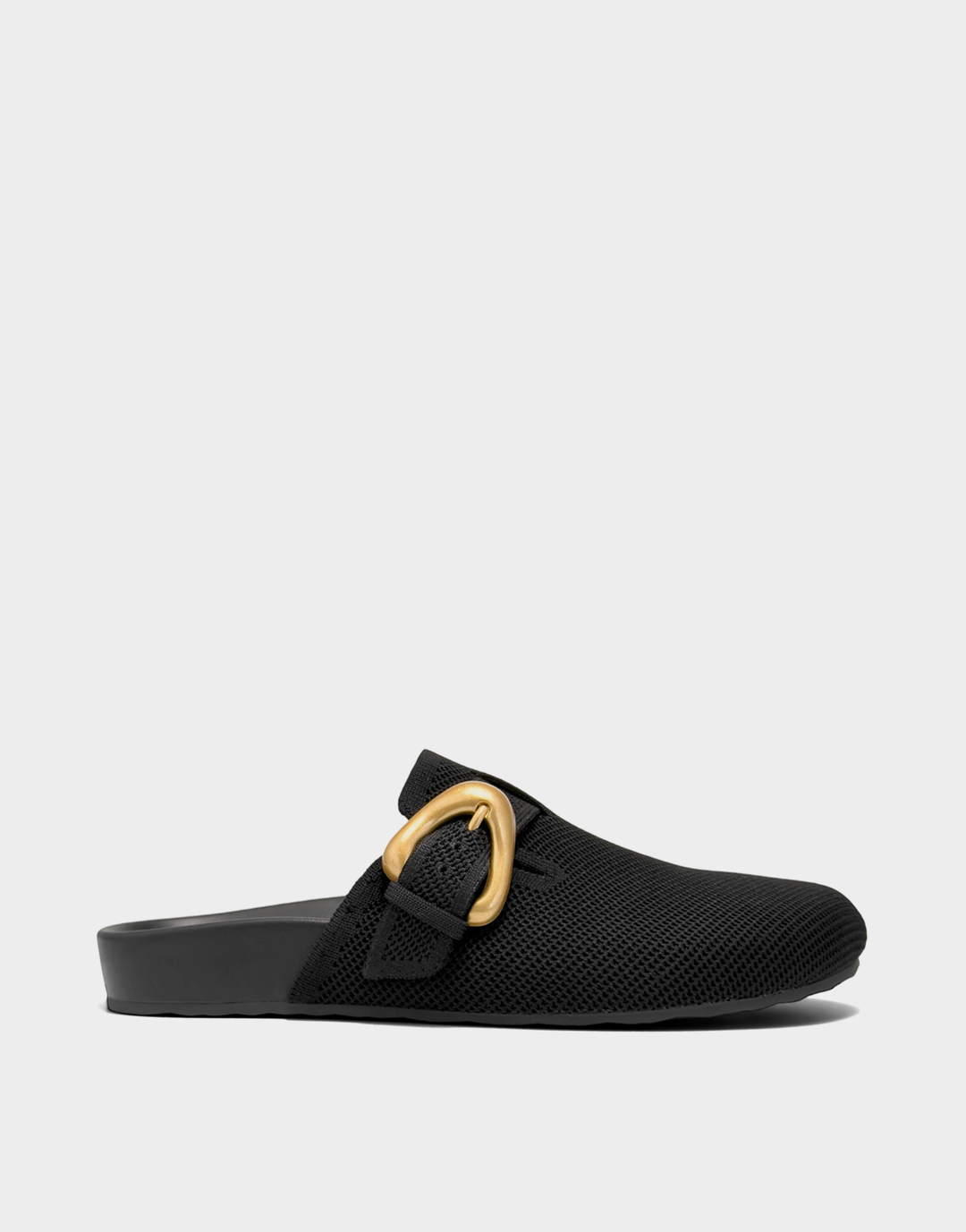 Side profile of the Aerosoles Lucca mule in black knit featuring an easy slip-on design and a walkable block heel.