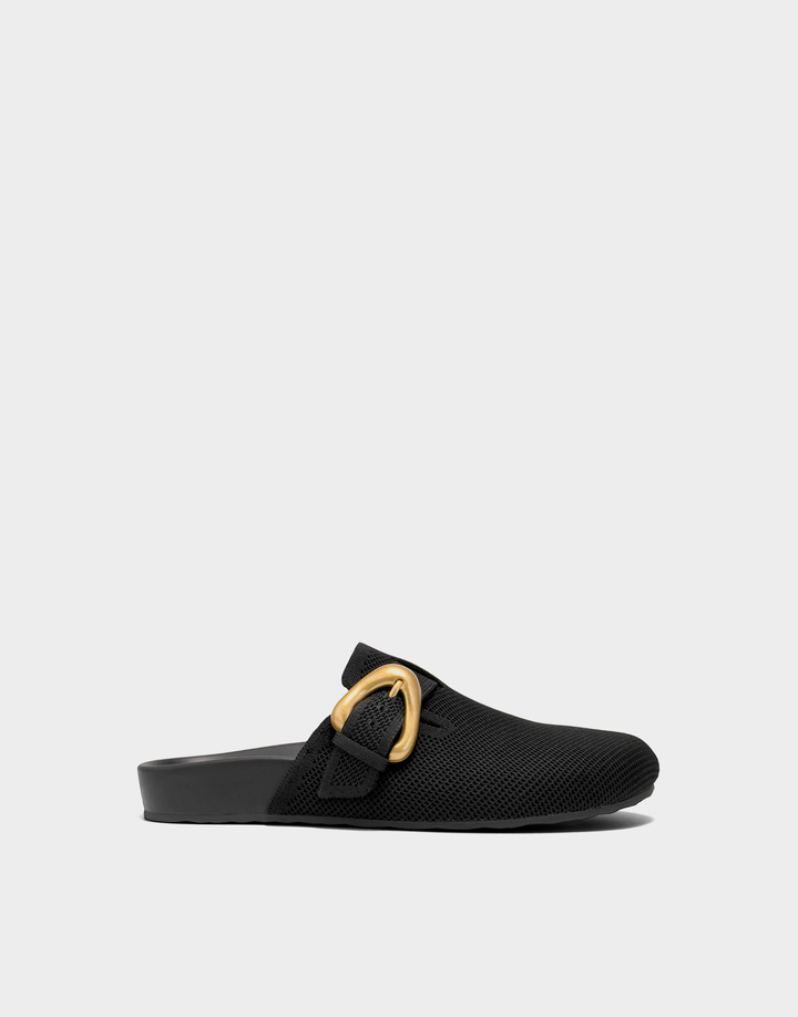 Side profile of the Aerosoles Lucca mule in black knit featuring an easy slip-on design and a walkable block heel.