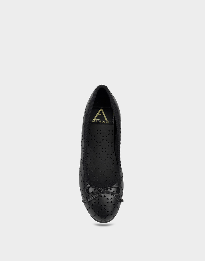 Top view of the Aerosoles Beyla black ballet flat featuring laser-cut details, round toe, and decorative bow for timeless everyday style.
