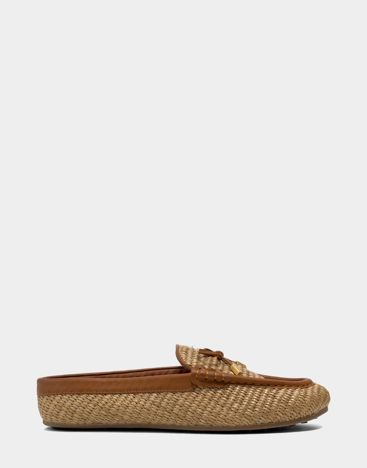 Side profile of the Aerosoles Daffodil loafer mule in Tan Basket Raffia featuring an easy slip-on design and a sleek, low-profile sole.